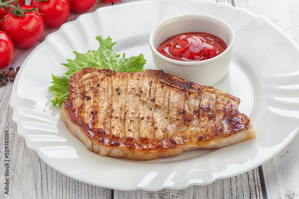 Grilled pork steak with ketchup Grilled pork steak with ketchup