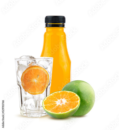 Fototapeta Naklejka Na Ścianę i Meble -  set orange with orange juice bottle in empty glass and ice