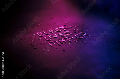 Close of black lives matter in creative liquid font