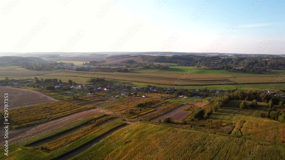 Rural landscape on sunset scene. Country houses at river in countryside. Village with wooden house. Suburban house in rural on sunset. Rural building at lake in countryside in autumn colors. Rural landscape on sunset scene. Country houses at river in countryside. Village with wooden house. Suburban house in rural on sunset. Rural building at lake in countryside in autumn colors.