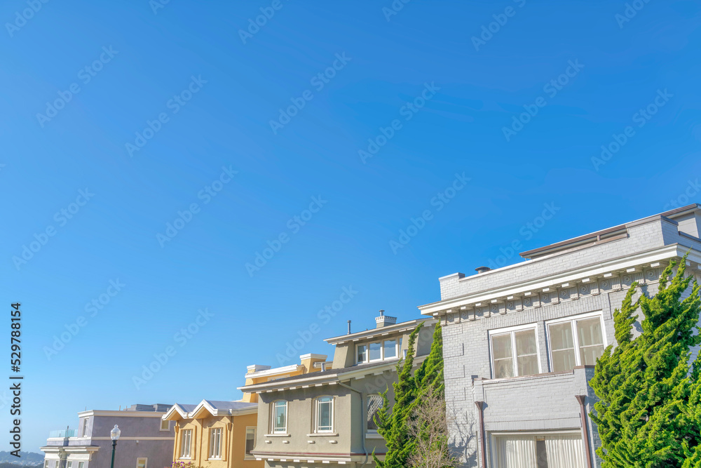 Houses in San Francisco, California against the clear blue sky