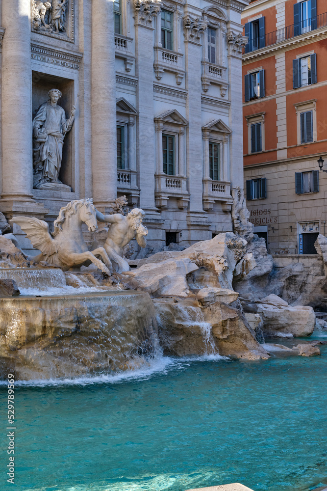 A detail view of the Trevi Fountain in the morning - no people. Tourist attraction in Rome.