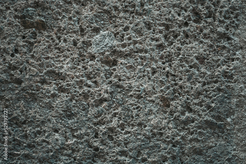 Gray stone background close up. Simple background in grunge style.