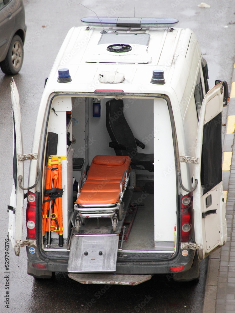 An empty stretcher in an ambulance car top view An empty stretcher in an ambulance car top view