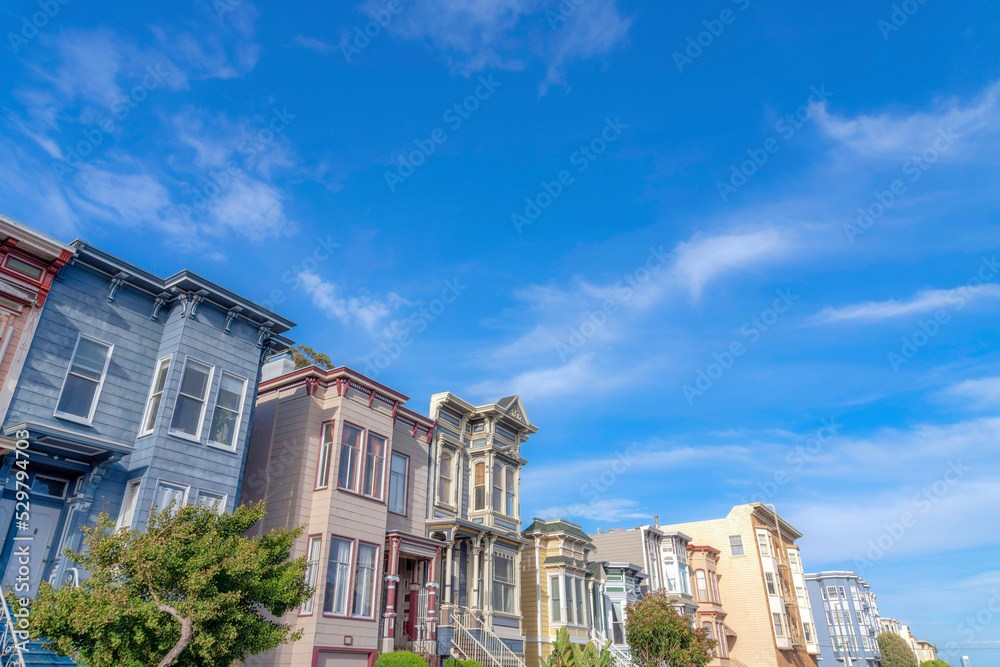 Low angle view of townhouses with wood wall sidings in San Francisco, California