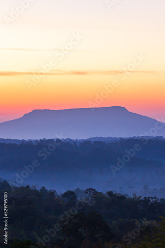 The scenery of blue mountains at dawn.