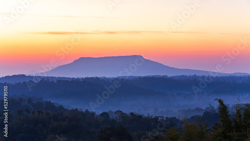 The scenery of blue mountains at dawn.