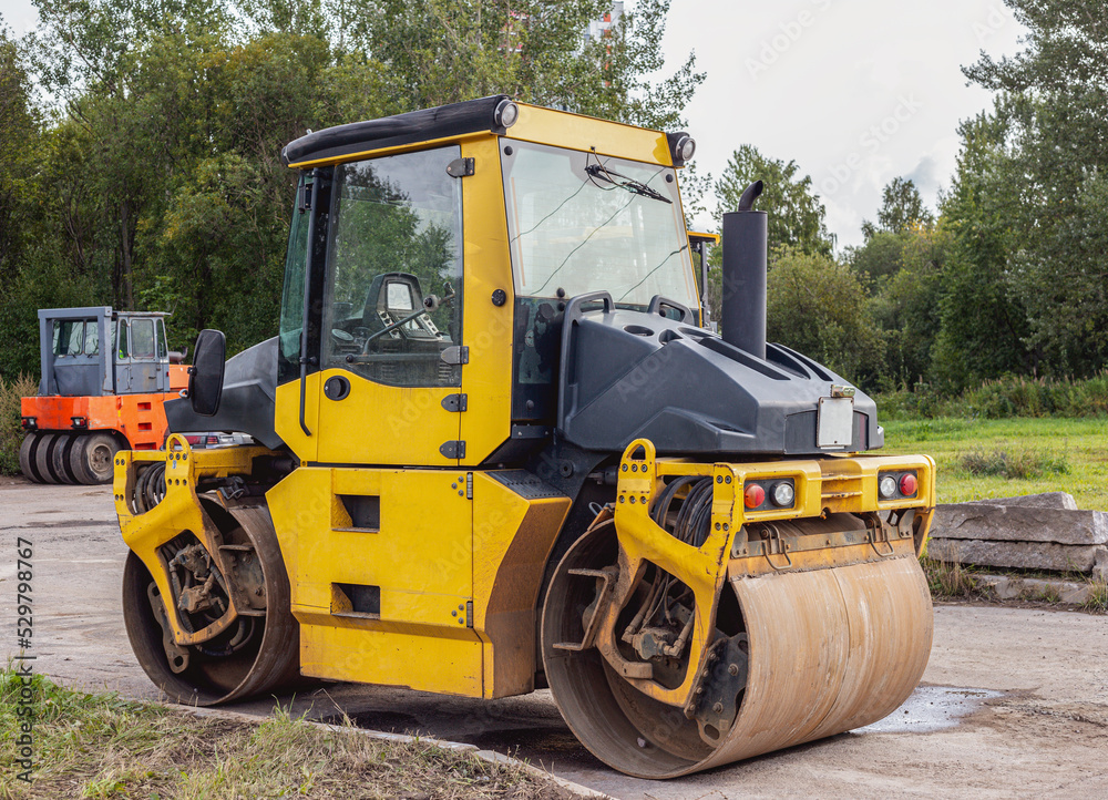 A skating rink for laying asphalt or sand during road repairs or construction. Road repair works on an asphalt skating rink. Laying of new asphalt is a selective focus.