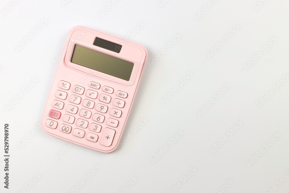 pink calaulator on white background. pink calaulator on white background.