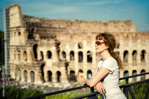Photography Young woman tourist on Colosseum background, Rome, Italy