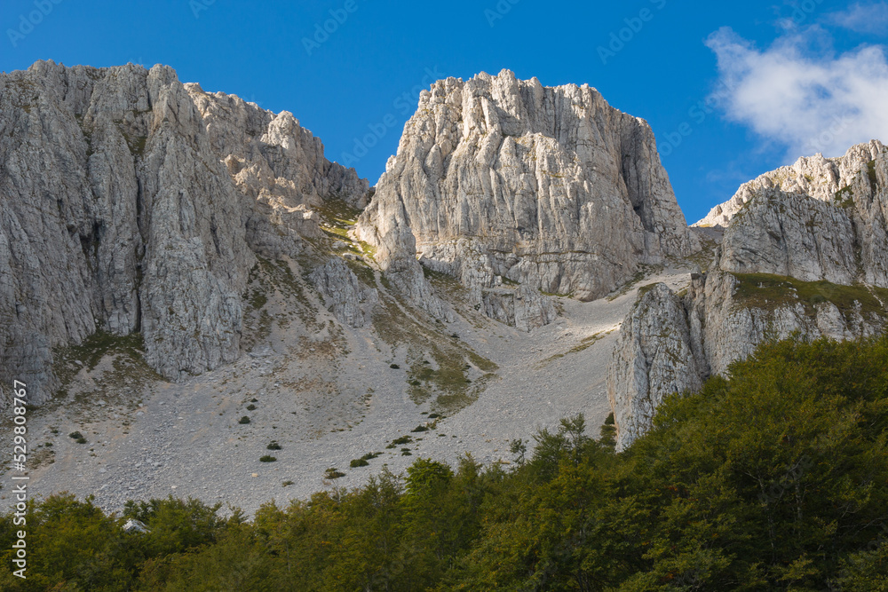 Beautiful view of Sirente rocky mountain in Abruzzo against the blue sky