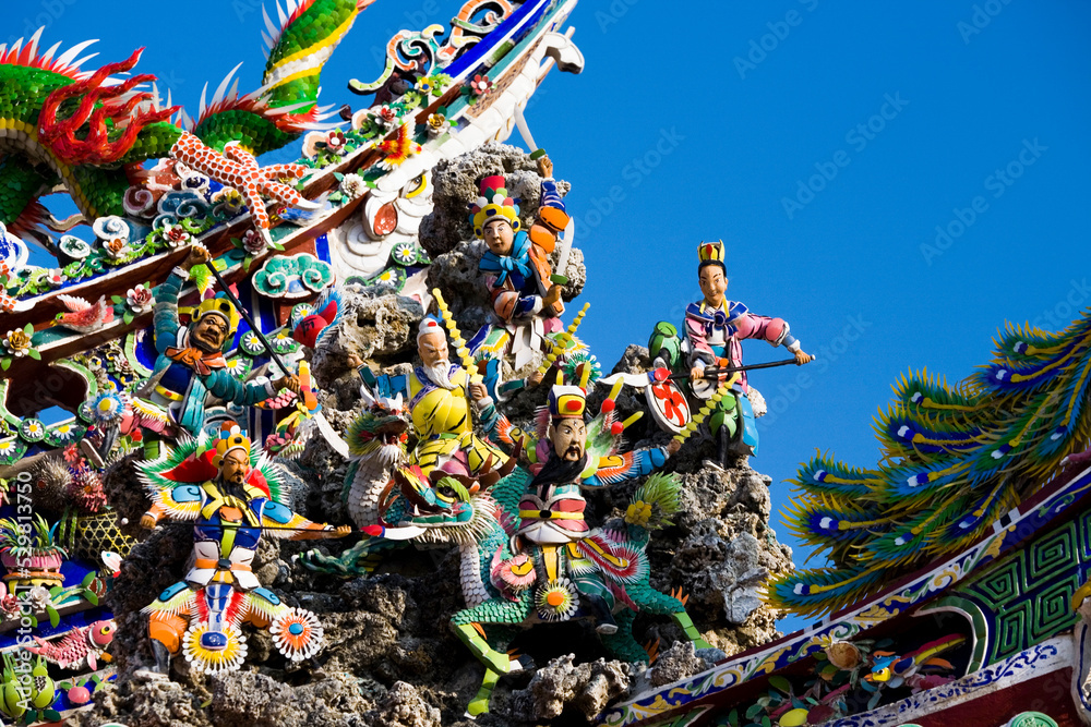 Close-up of decorative art on the rooftop of a temple building in Taiwan.