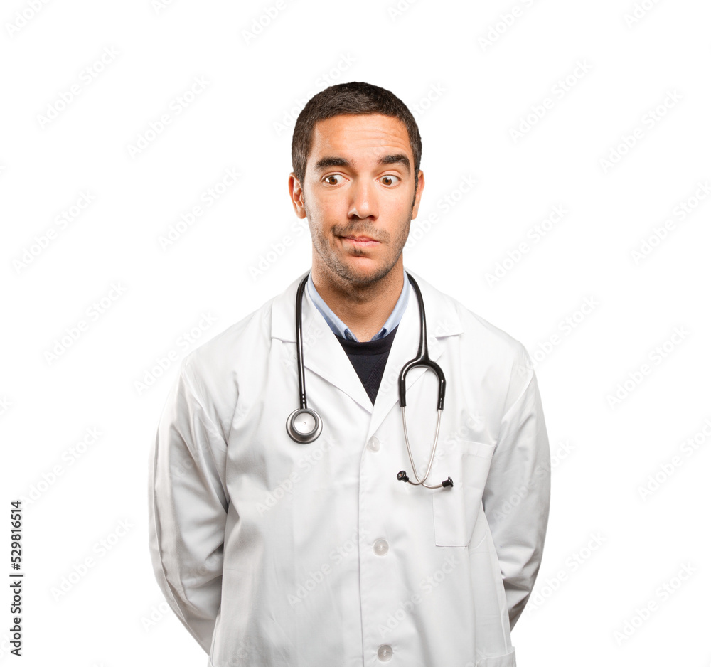 Stressed doctor against white background Stressed doctor against white background