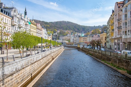 Outdoor view of buildings and the Tepla River in the city of Carlsbad in the Czech republic photo