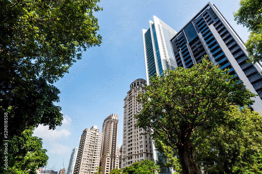 Low-angle view of the modern architectural landscape in Taichung, Taiwan. Low-angle view of the modern architectural landscape in Taichung, Taiwan.