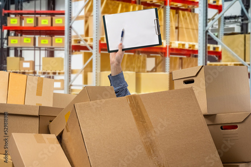 Stocktake at warehouse. Man...