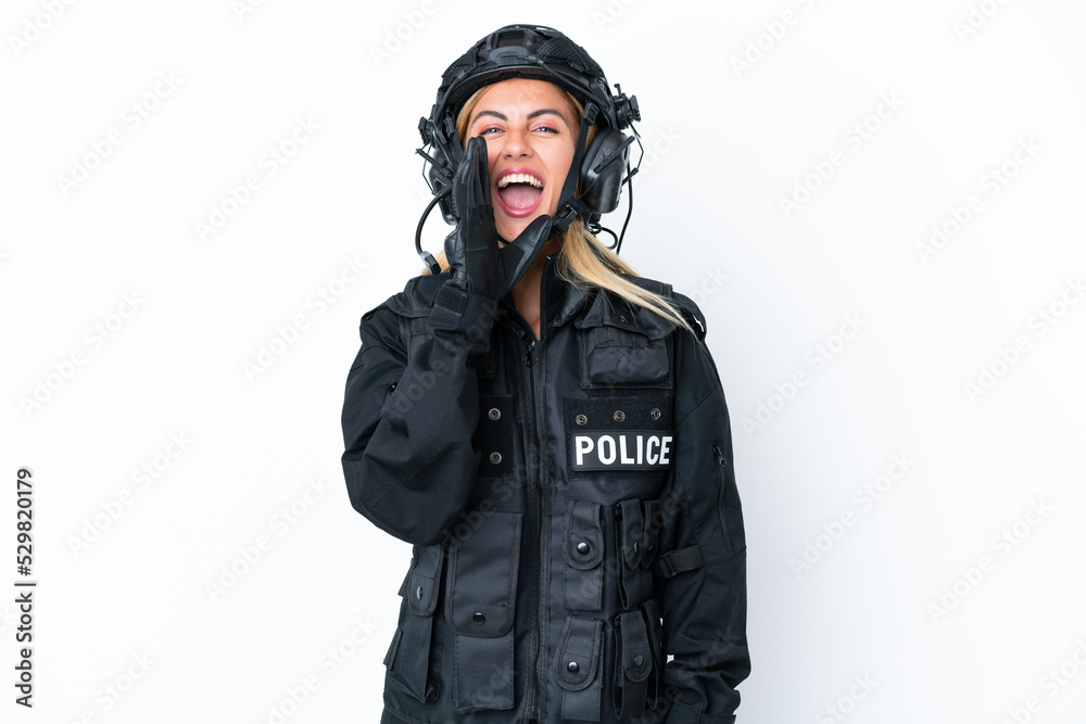 SWAT caucasian woman isolated on white background shouting with mouth wide open SWAT caucasian woman isolated on white background shouting with mouth wide open