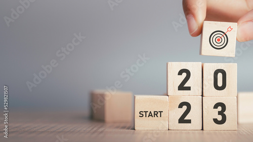 Start 2023 concept, 2023 years Target successful in wood cube for beginning new year for planning. background for the happy new years for text with copy space.