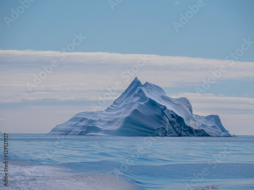 Giant pyramid shaped iceberg just off the coast of Disko Island, near Qeqertarsuaq, Disko Bay, Western Greenland