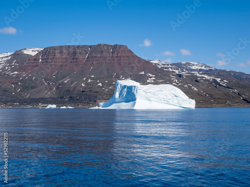 Giant icebergs just off the city of Qeqertarsuaq, Disko Island, Disko Bay, Western Greenland