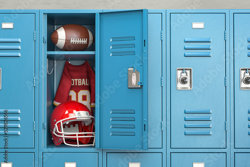 American football locker room with equipment, ball and helmet.