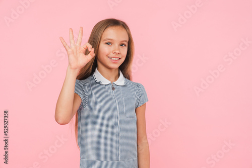 Quadro su tela Young smart caucasian preteen teenager girl schoolgirl daughter in blue dress lo