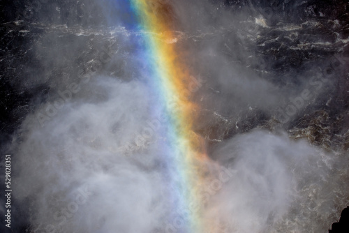 Rainbow in waterfall spray
