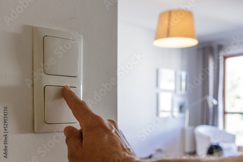 Saving energy at home, turning off the light