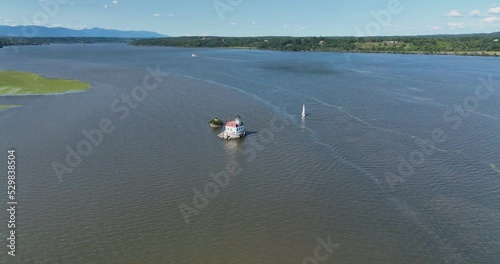 09-08-2022 - Town of Esopus, NY,  Aerial video with orbit or arc around the historic Esopus Meadows Lighthouse located on the Hudson River.
 photo