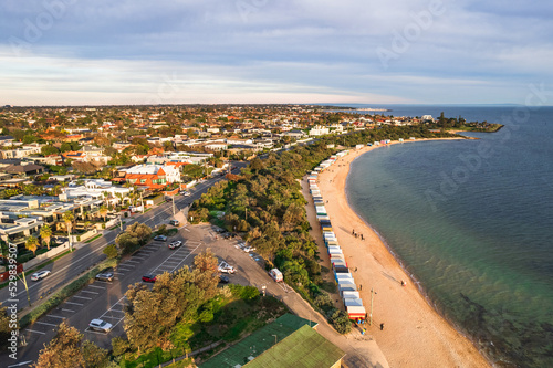 Drone aerial view Melbourne bathing boxes on Brighton beach
