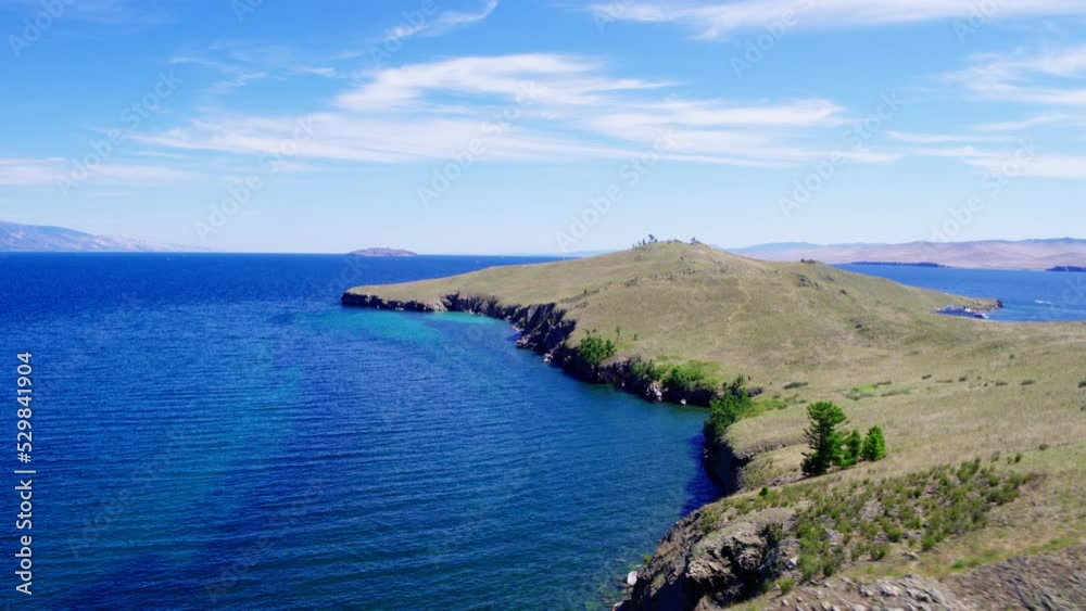 Ogoy Island with a Buddhist Stupa of Enlightenment on Lake Baikal in Siberia. Shooting from a drone Ogoy Island with a Buddhist Stupa of Enlightenment on Lake Baikal in Siberia. Shooting from a drone