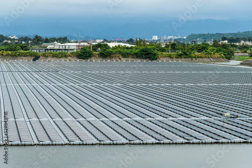 View of the floating Solar power system at Flood Detention Pond in Miaoli, Taiwan. photo