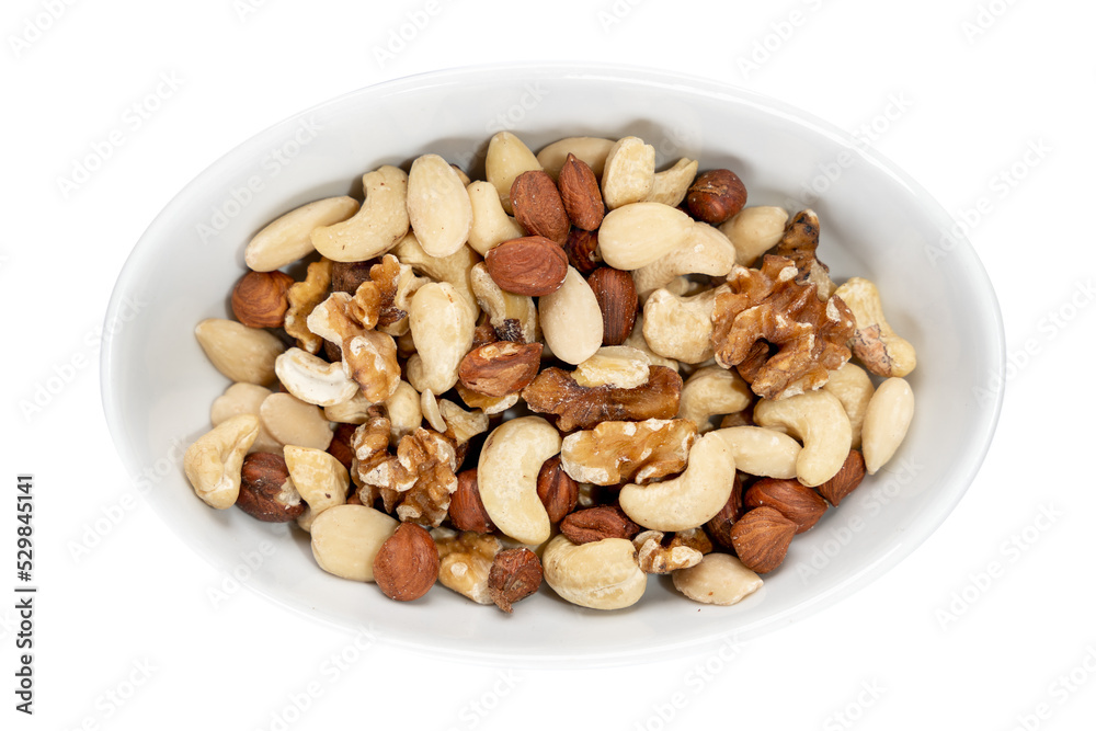 Eine Schale voller Nüsse, Mandeln, Cashews, Haselnüssen und Walnüssen - Studentenfutter Eine Schale voller Nüsse, Mandeln, Cashews, Haselnüssen und Walnüssen - Studentenfutter