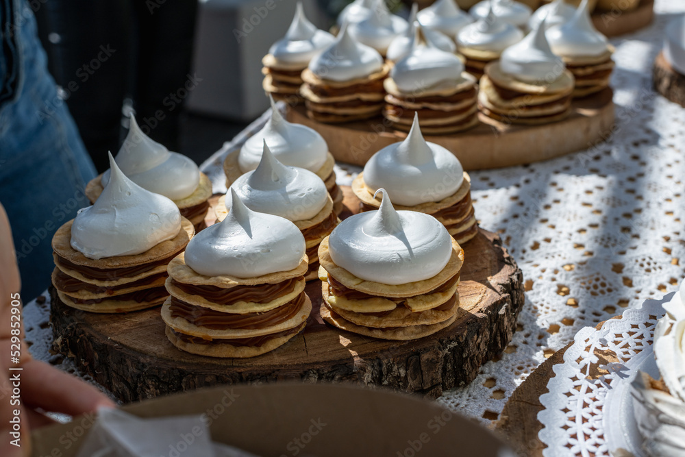 pastry product for parties with dulce de leche cream and meringue pastry product for parties with dulce de leche cream and meringue