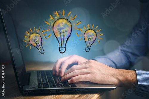 man working computer and bulb  drawing icons