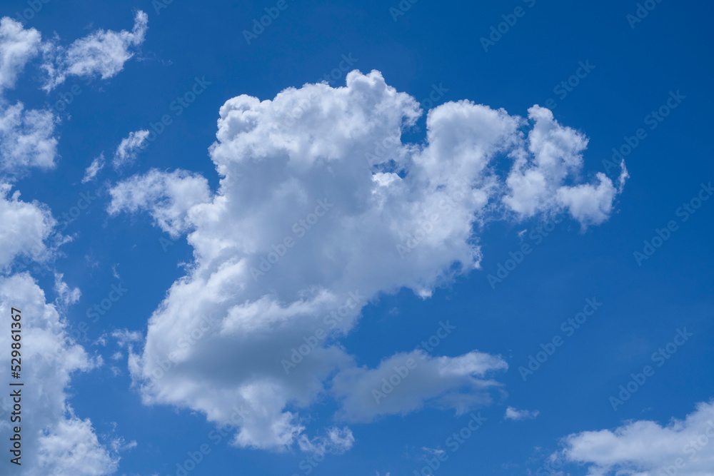 Blue sky with white clouds. Sky and clouds during the daytime in the summer. Blue sky with white clouds. Sky and clouds during the daytime in the summer.