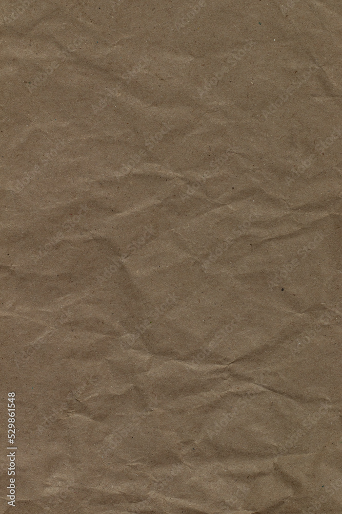 Naklejka premium Brown kraft paper background. Full frame photo.