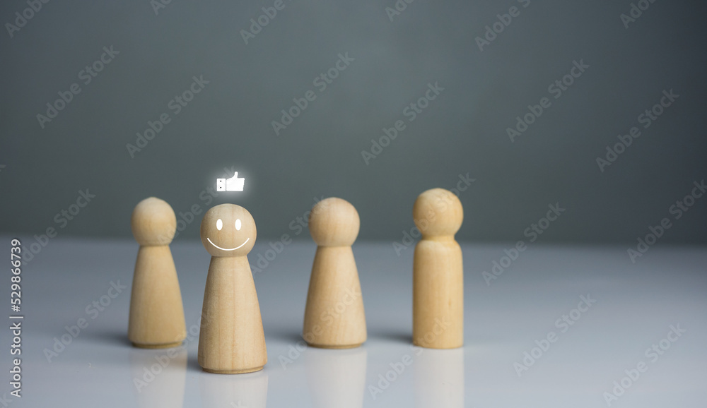 Concept of leadership, lead, inspire, empower, business, manager, teamwork, vision, strategy, influence, competition. Wooden doll leading the team Concept of leadership, lead, inspire, empower, business, manager, teamwork, vision, strategy, influence, competition. Wooden doll leading the team