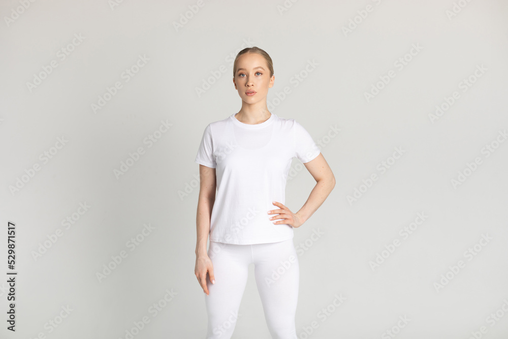 Attractive blonde woman in white t-shirt. Mock-up. Attractive blonde woman in white t-shirt. Mock-up.