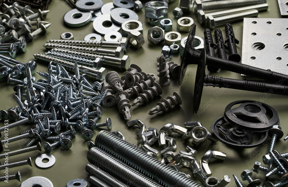 Set of bolts nuts nails metal fasteners. Consumable hardware tools.  assortment steel screws collection close up background Photos | Adobe Stock