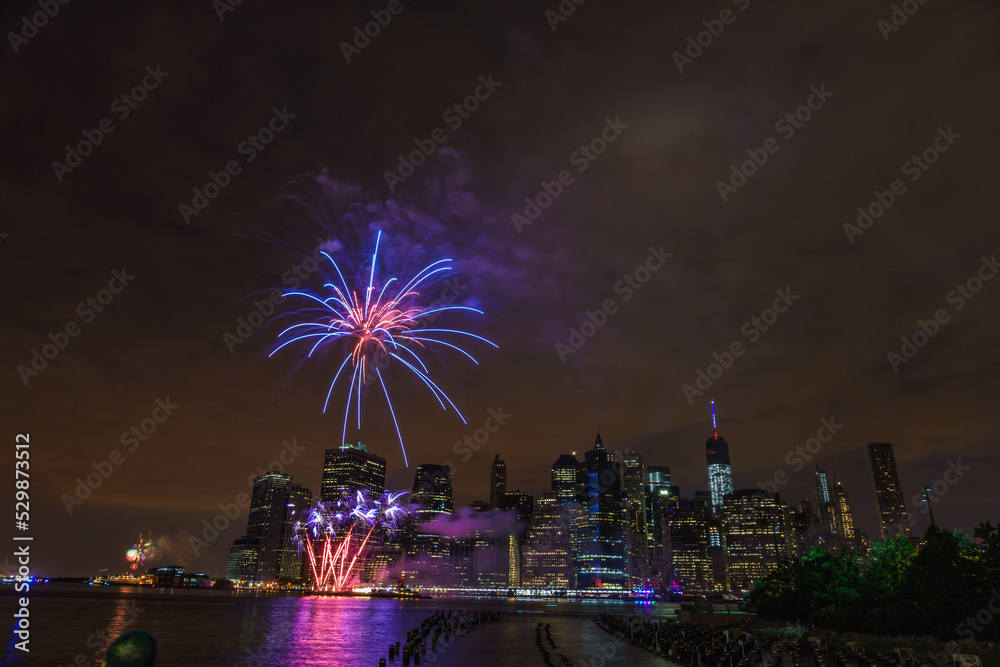 Fototapeta premium fireworks of independence day 4th of july Brooklyn Old Pier looking at One World Trade Center manhattan