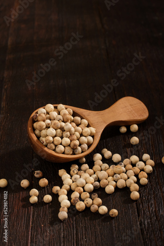 Spoon of White pepper background texture