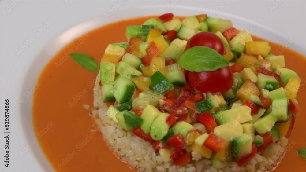 Vegan salad recipe based on bulgur with small vegetables, avocado, tomato, cucumber, pepper, nectarine fruit, tomato basil sauce and olive oil and lemon Vegan salad recipe based on bulgur with small vegetables, avocado, tomato, cucumber, pepper, nectarine fruit, tomato basil sauce and olive oil and lemon