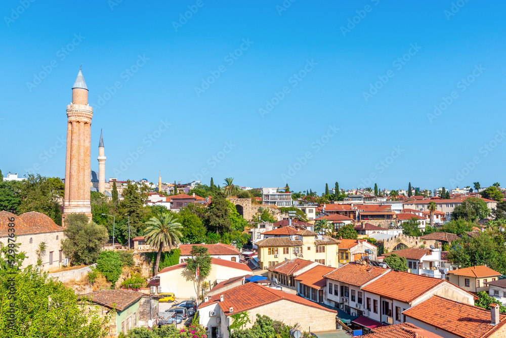 Panorama of the old city (Kaleiçi) in Antalya (Turkey) on a summer day under a blue sky