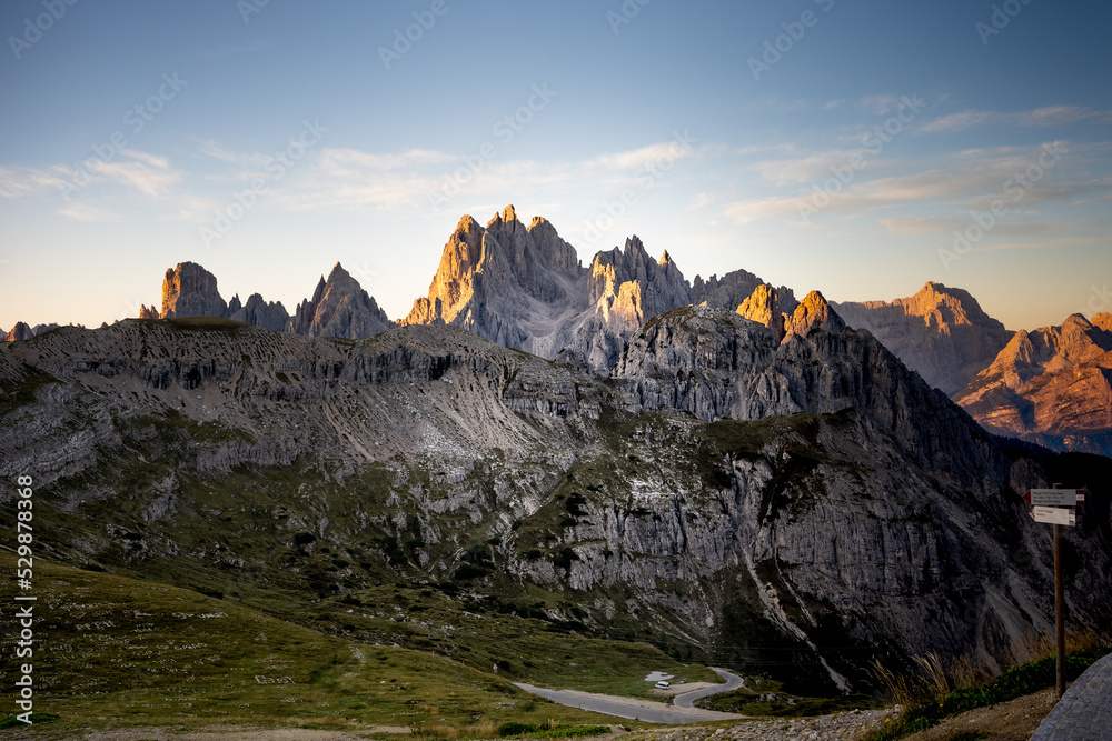 The mountains of the Cadini Group at sunrise at the Drei Zinnen Hütte in the Dolomites in South Tyrol, Italy.