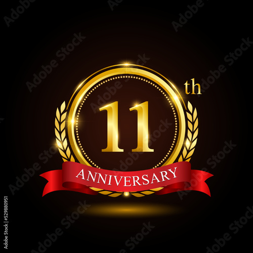 11th golden anniversary template design, with shiny ring and red ribbon, laurel wreath isolated on black background, logo vector