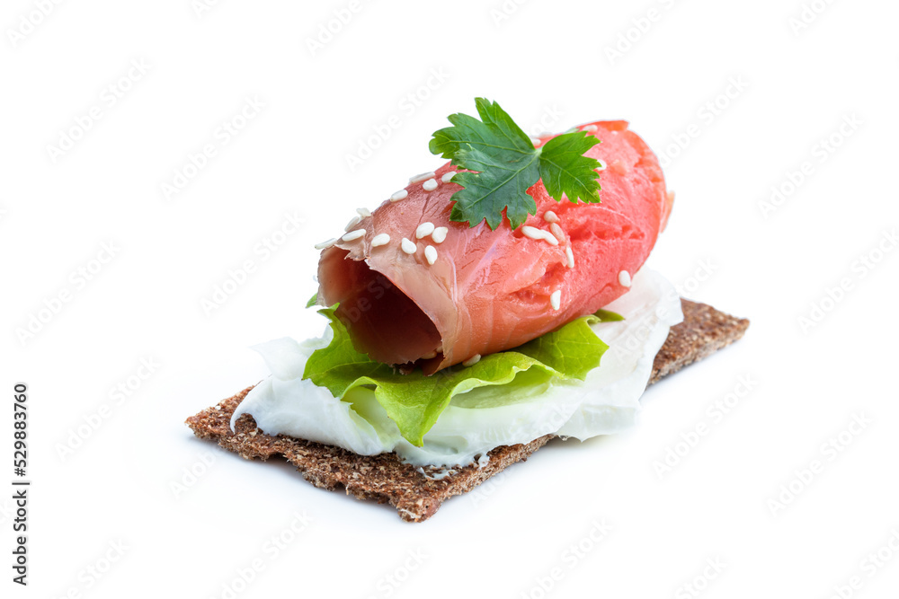 Healthy toast with rye bread and salmon isolated on white