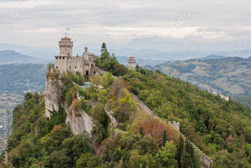 View of the Guaita Fortress on Mount Titano in San Marino. Tower on a cliff over 800 meters high in an independent state in the heart of Italy