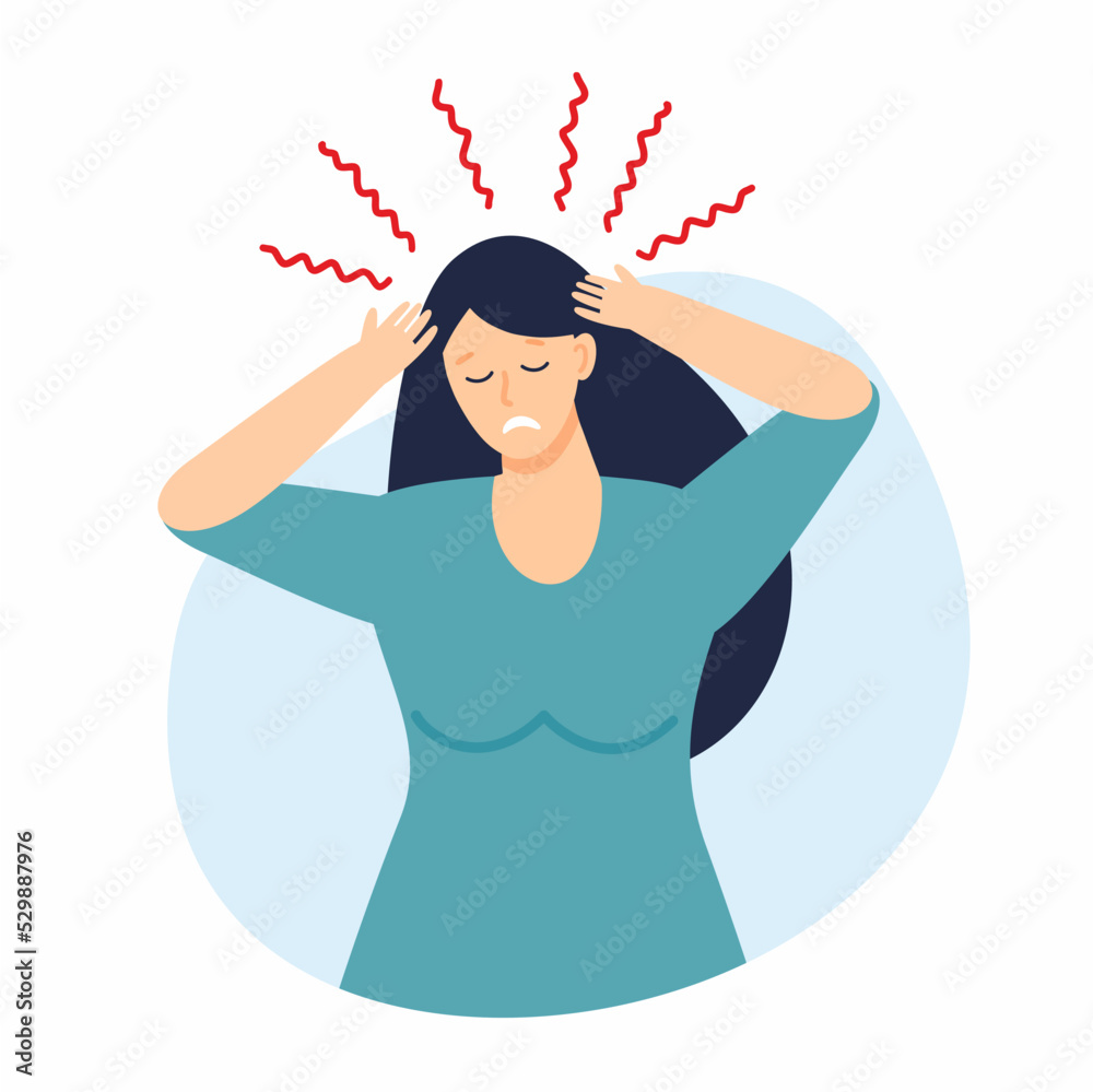 A sad girl holds her head, suffering from headaches and psychological problems. A sad girl holds her head, suffering from headaches and psychological problems.