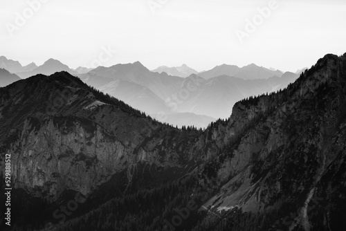 A beautiful monochrome landscape of Alpine mountain ridge. Alps. Bavaria, Germany, Europe. Artistic look in black and white style.